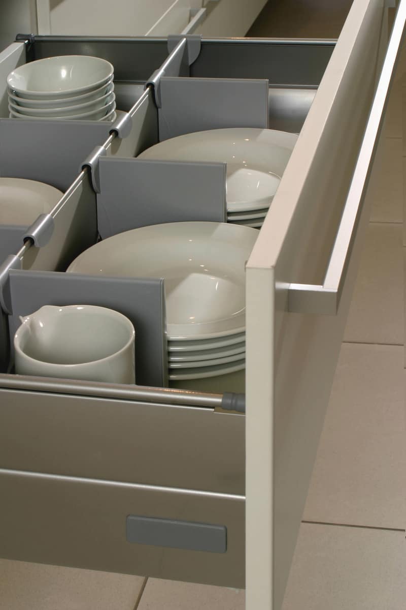 drawer with plates in a modern kitchen